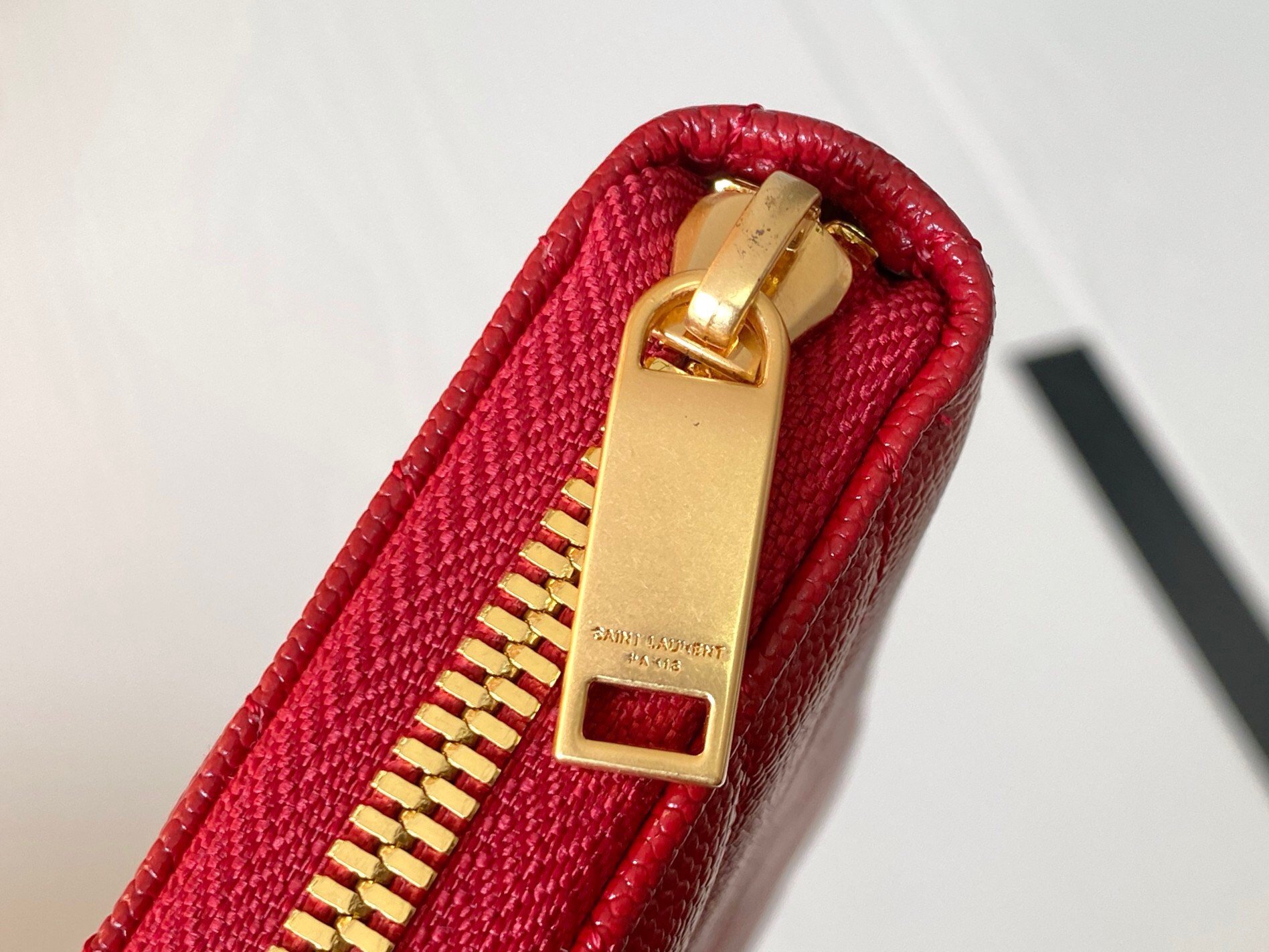 Saint Laurent Cassandre Zip Around Wallet in Red Matelasse Leather