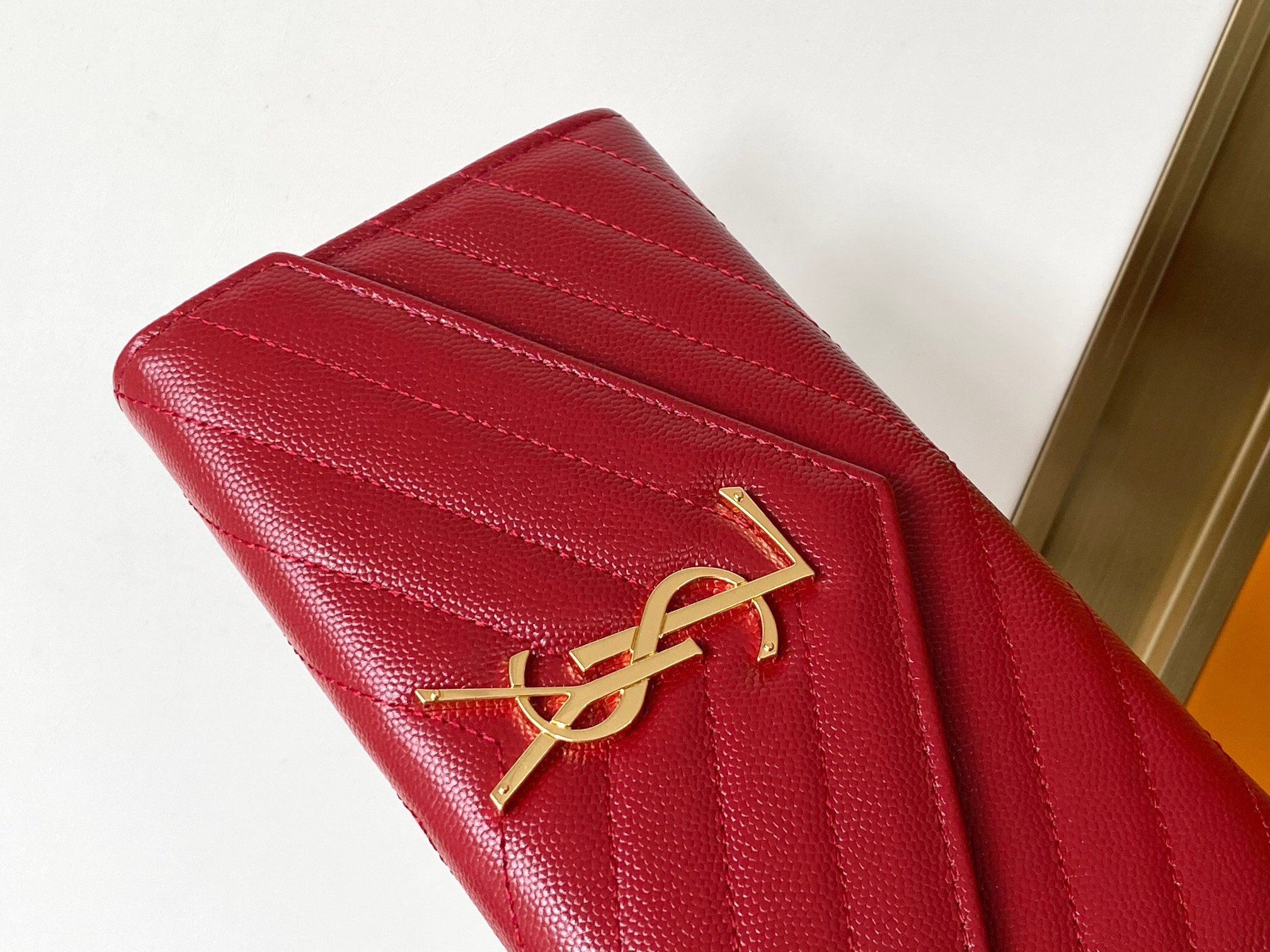 Saint Laurent Cassandre Large Flap Wallet in Red Matelasse Leather