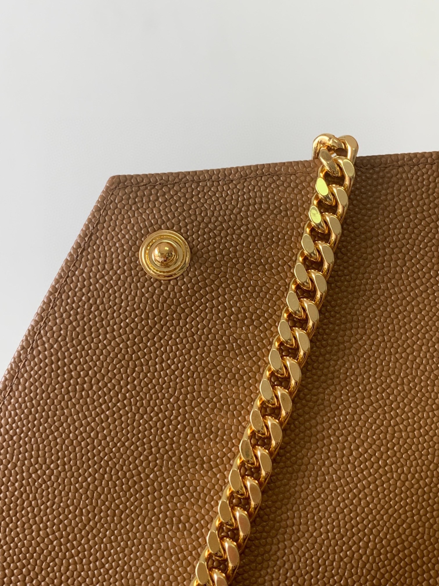 Saint Laurent Cassandre Matelasse Chain Wallet in Brown Grained Leather