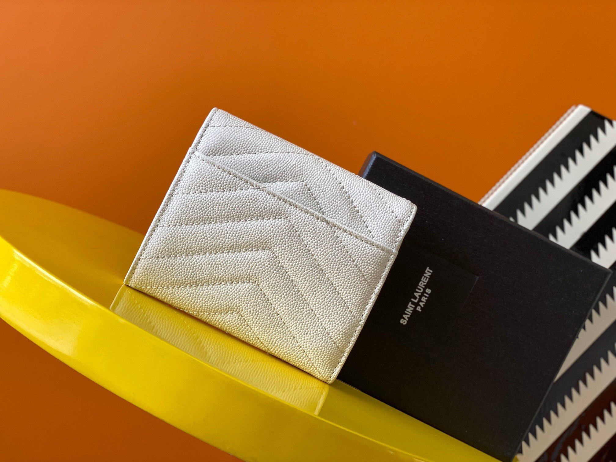 Saint Laurent Cassandre Tri-fold Wallet in White Matelasse Leather