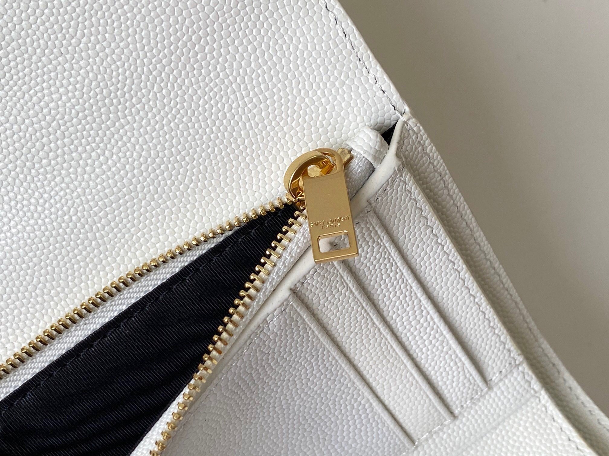 Saint Laurent Cassandre Tri-fold Wallet in White Matelasse Leather