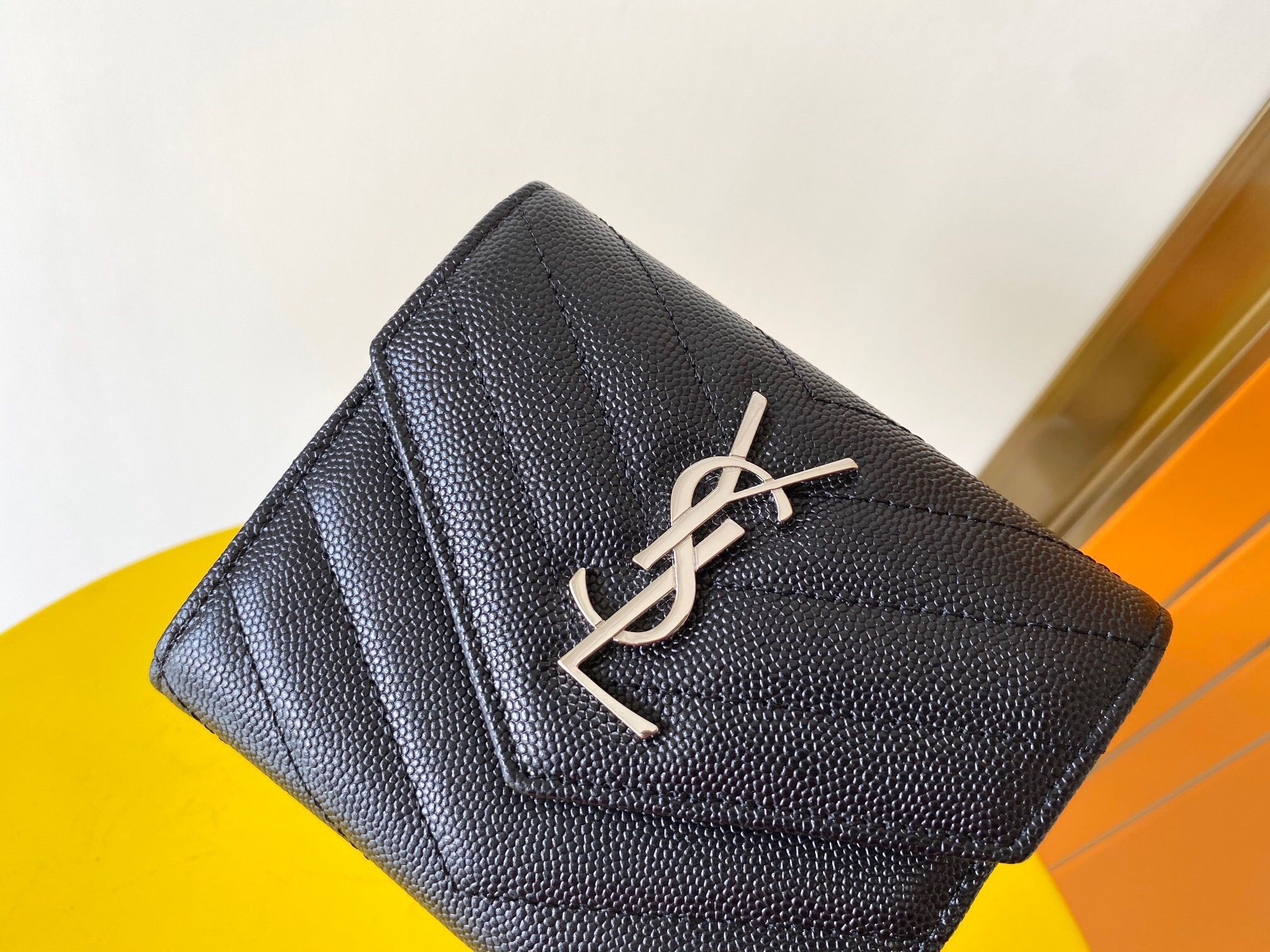 Saint Laurent Cassandre Tri-fold Wallet in Noir Matelasse Leather