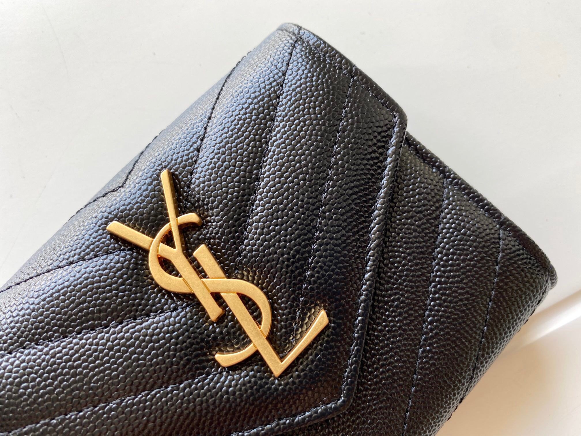 Saint Laurent Cassandre Tri-fold Wallet in Black Matelasse Leather