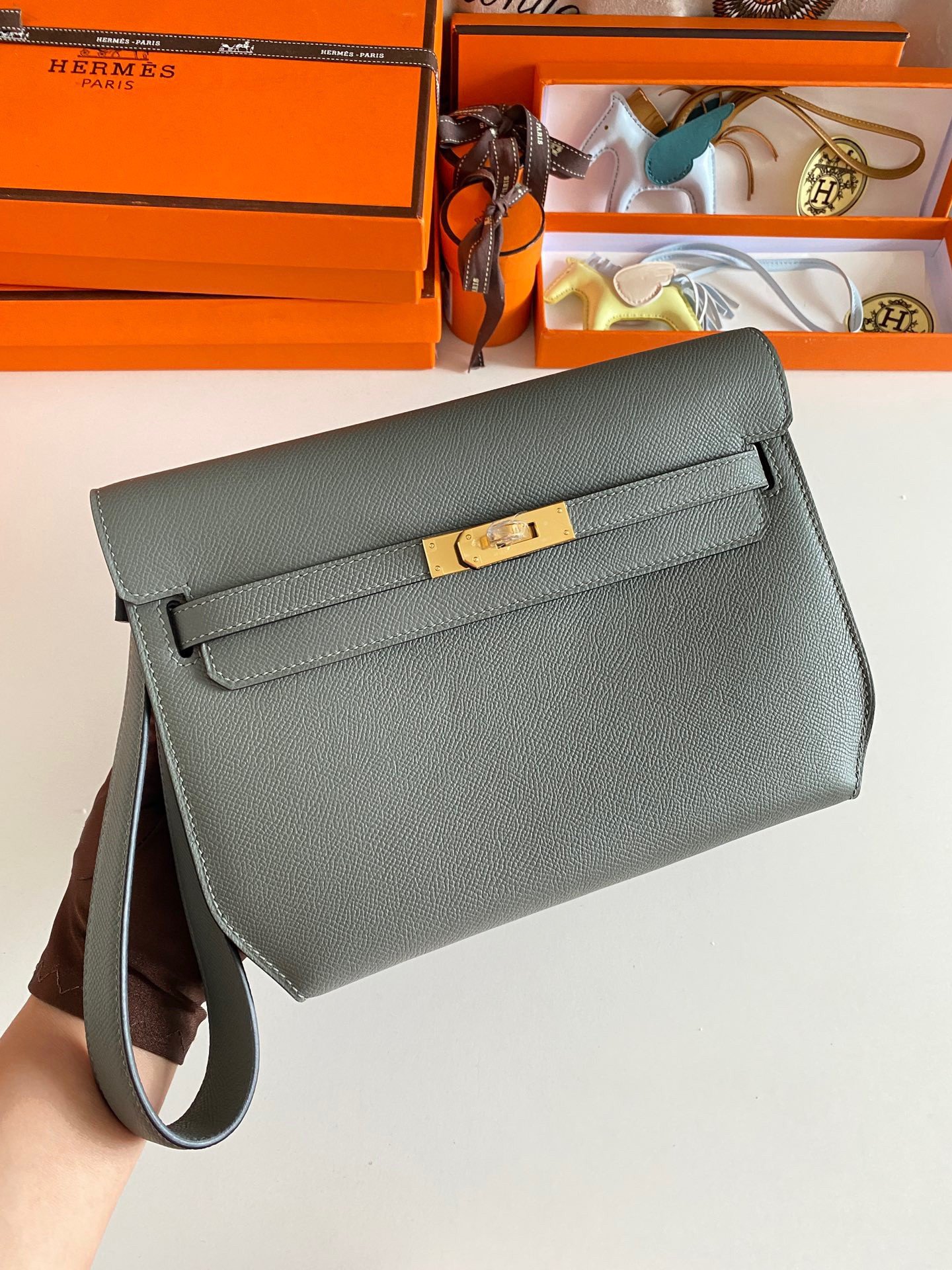 Hermes Kelly Depeches 25 Pouch in Vert Amande Epsom Calfskin