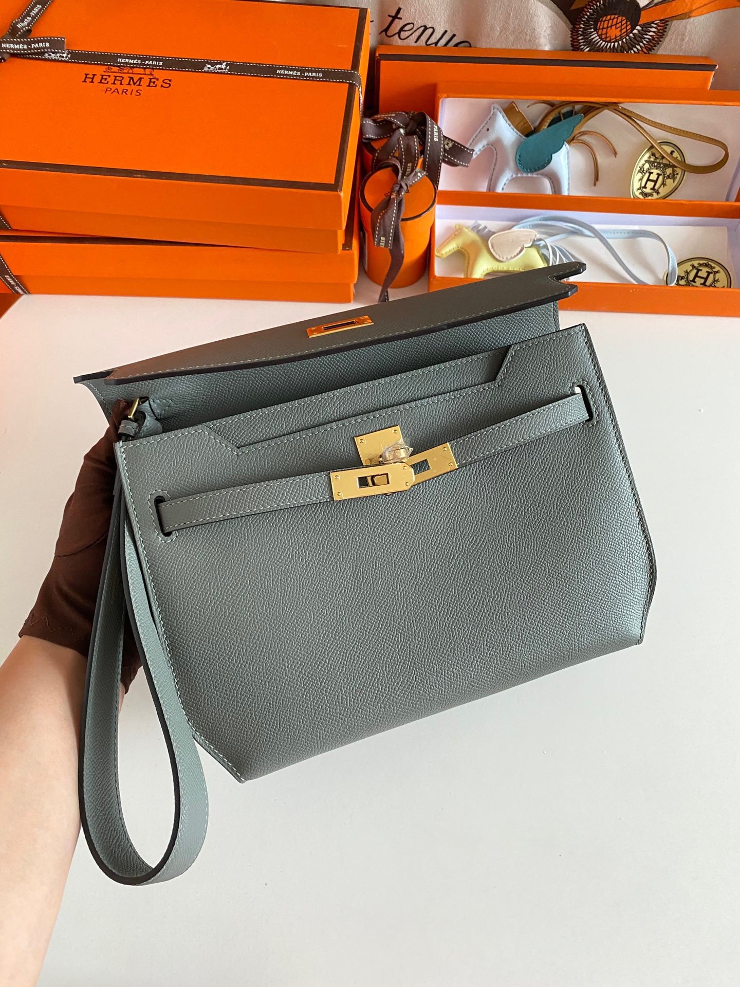 Hermes Kelly Depeches 25 Pouch in Vert Amande Epsom Calfskin