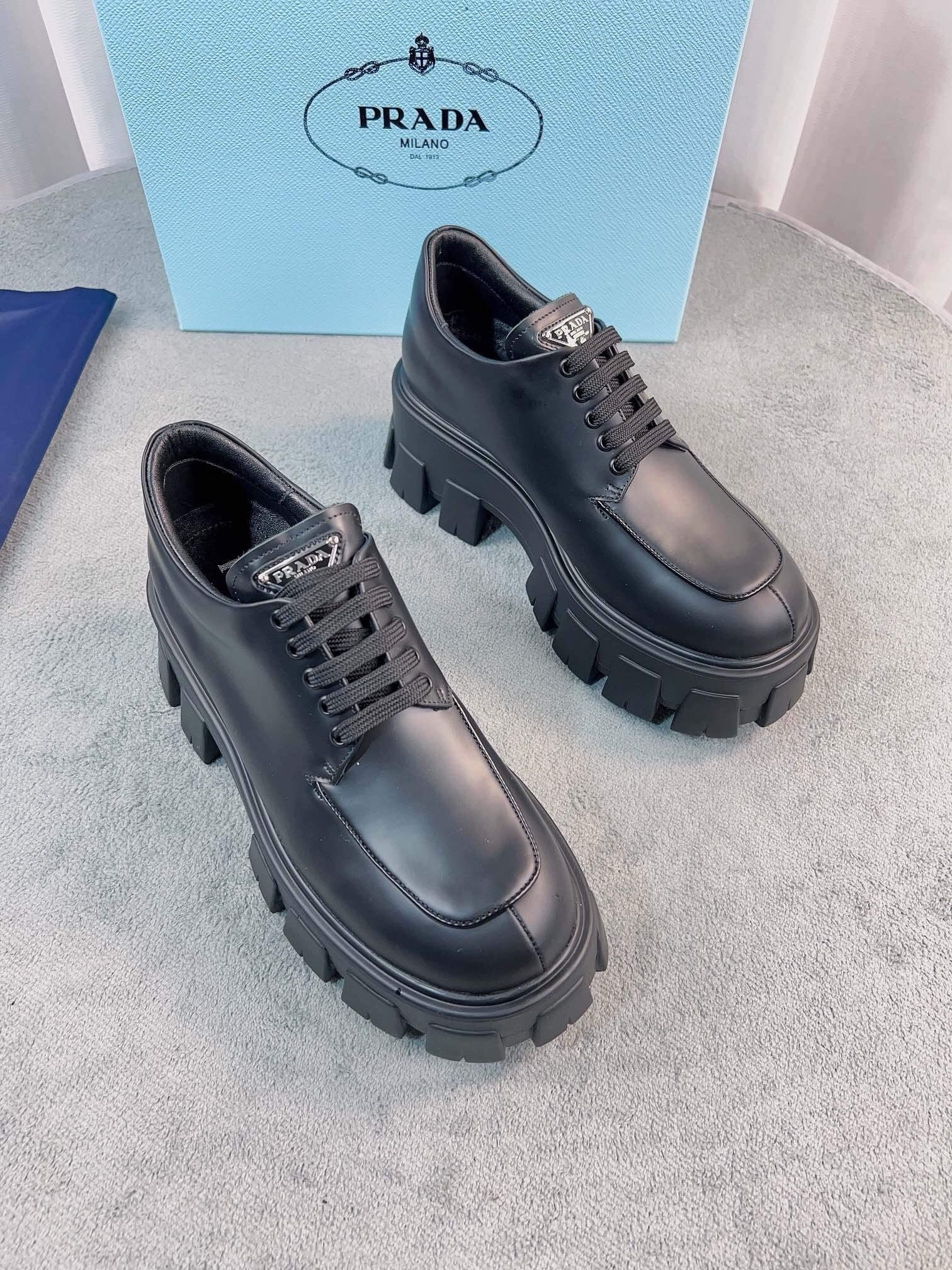 Prada Monolith Lace-up Shoes in Black Brushed Leather