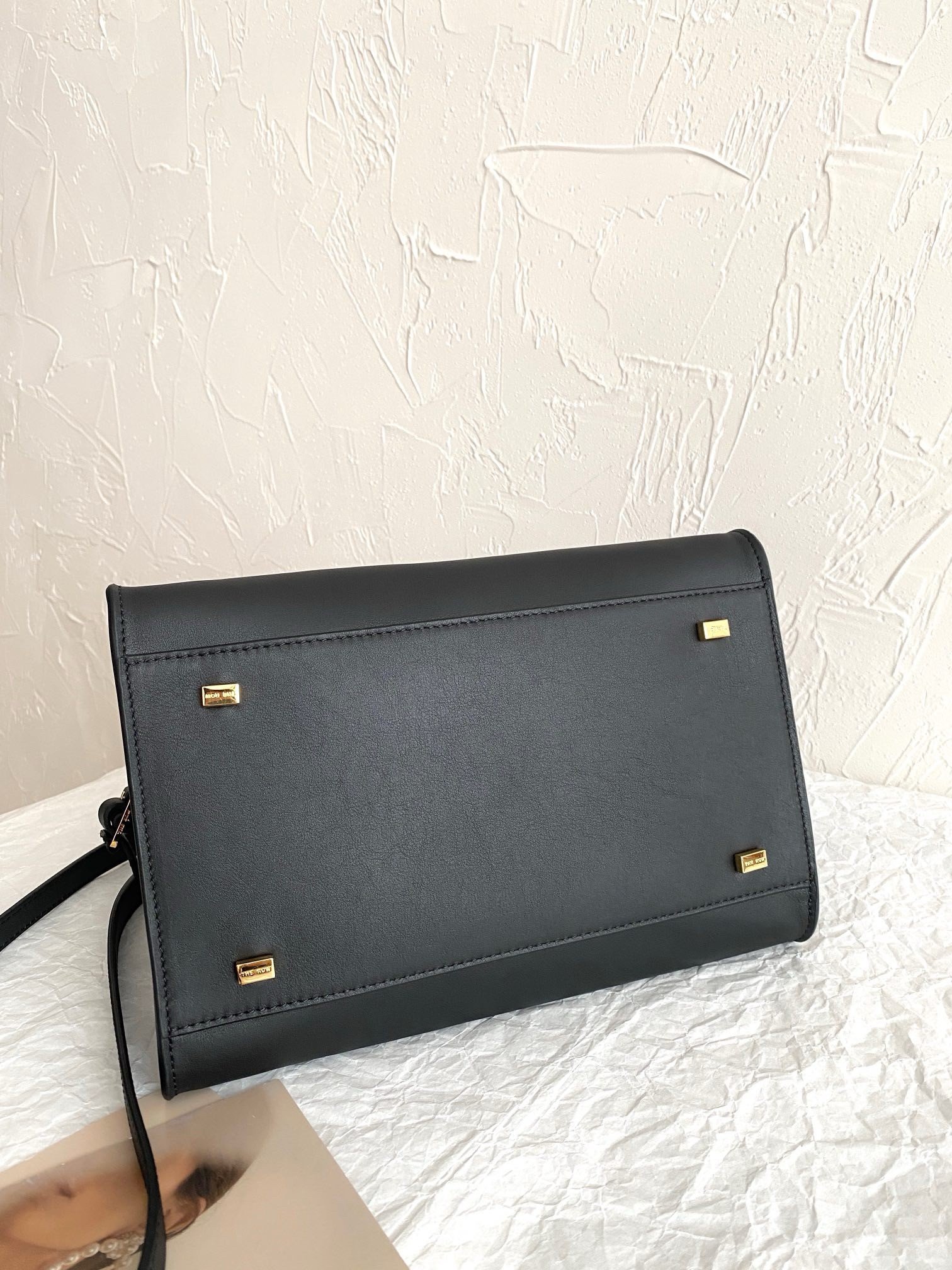 The Row Margaux 10 Top Handle Bag in Black Leather