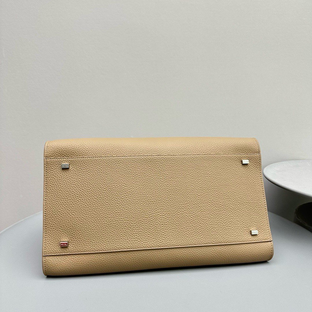 The Row Margaux 15 Top Handle Bag in Sand Grained Leather