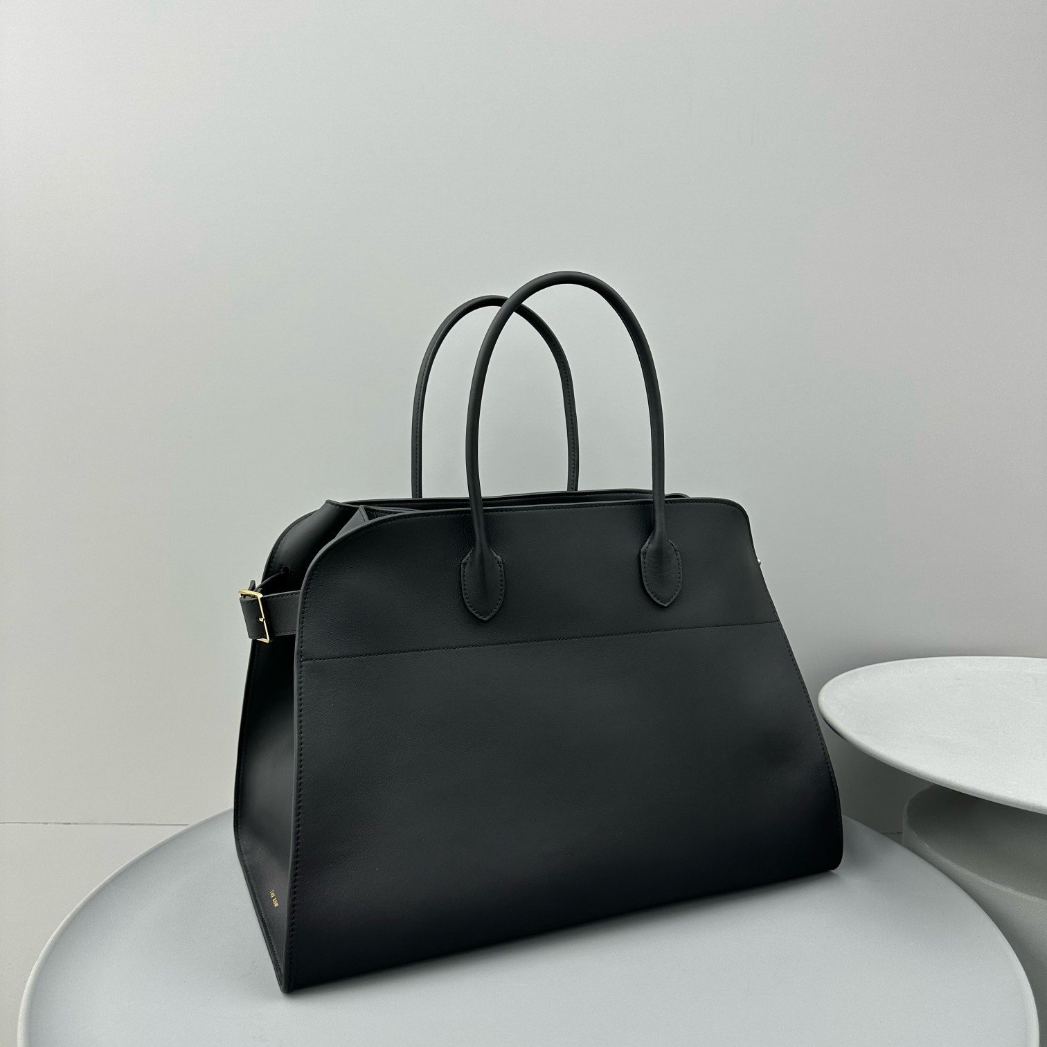 The Row Margaux 17 Top Handle Bag in Black Leather