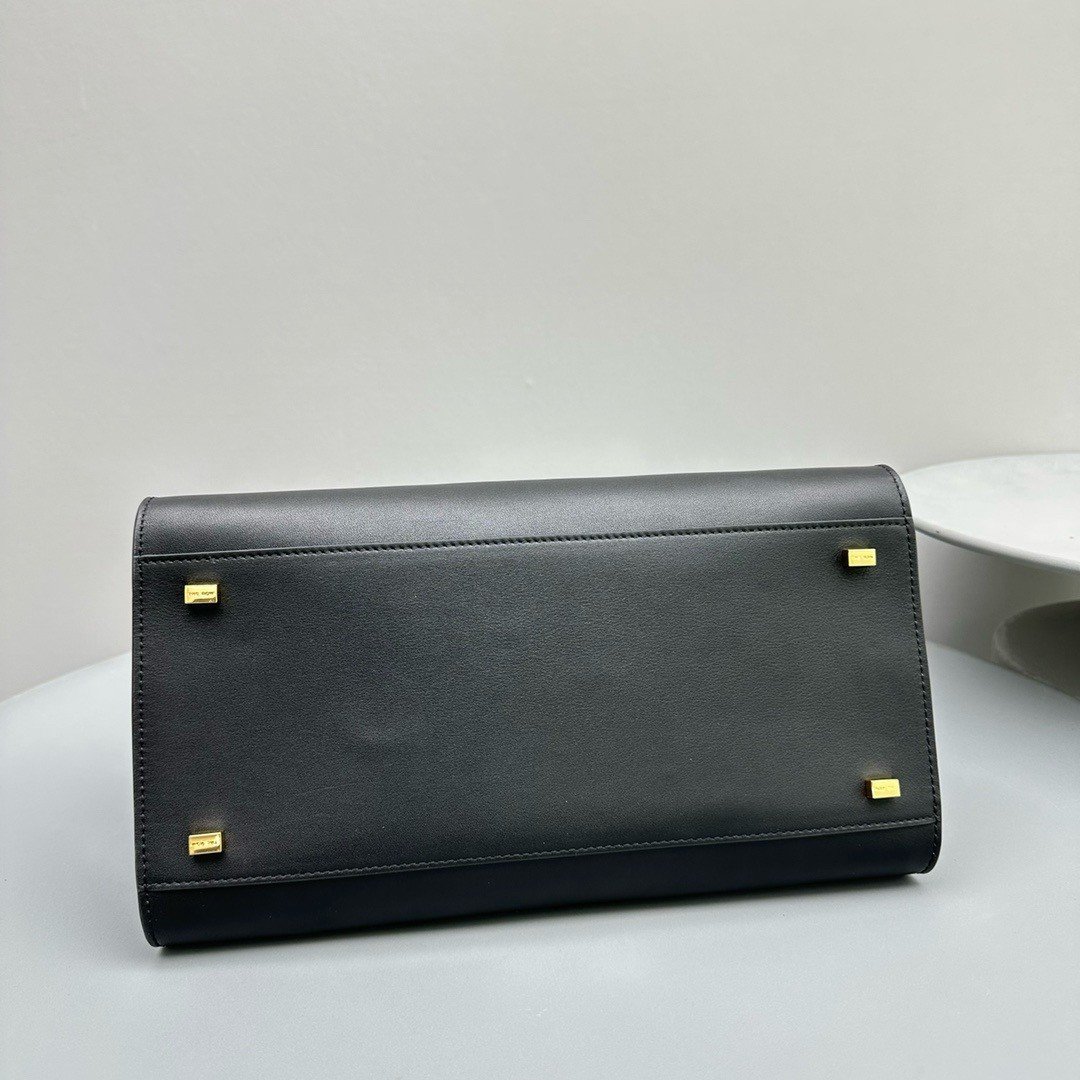 The Row Margaux 12 Top Handle Bag in Black Leather