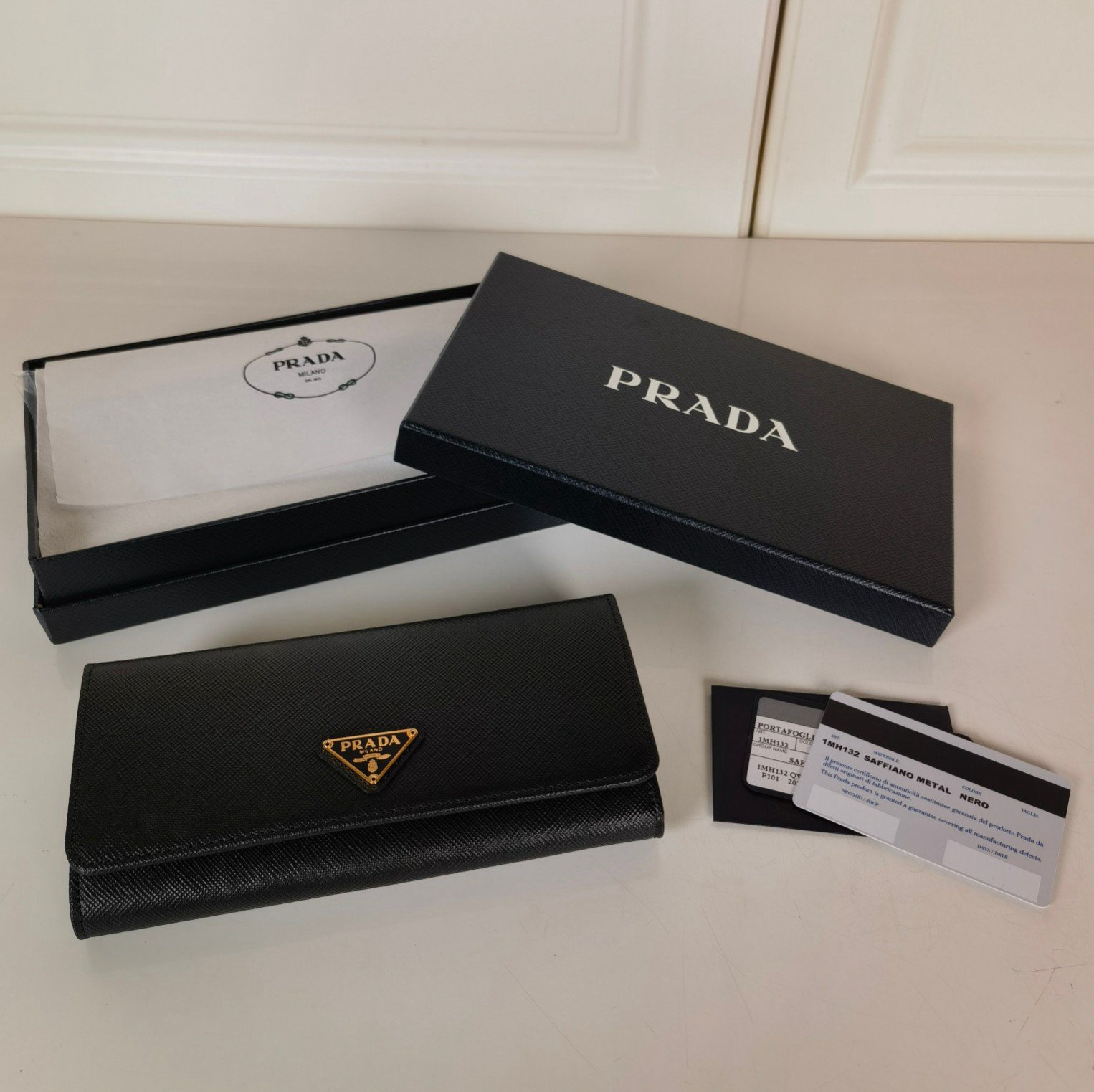 Prada Flap Continental Wallet in Black Saffiano Leather