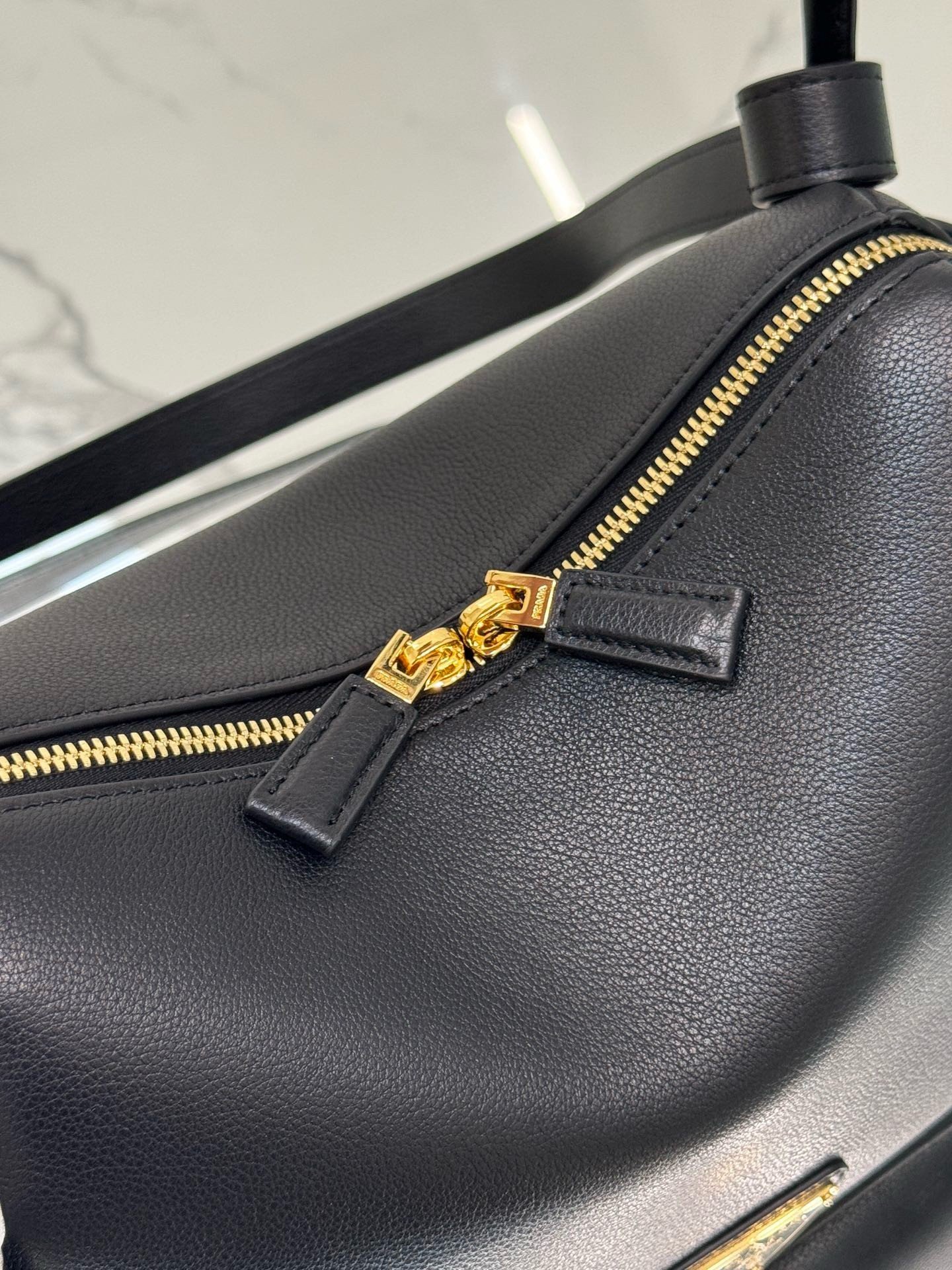 Prada Top Handle Bag in Black Grained Leather