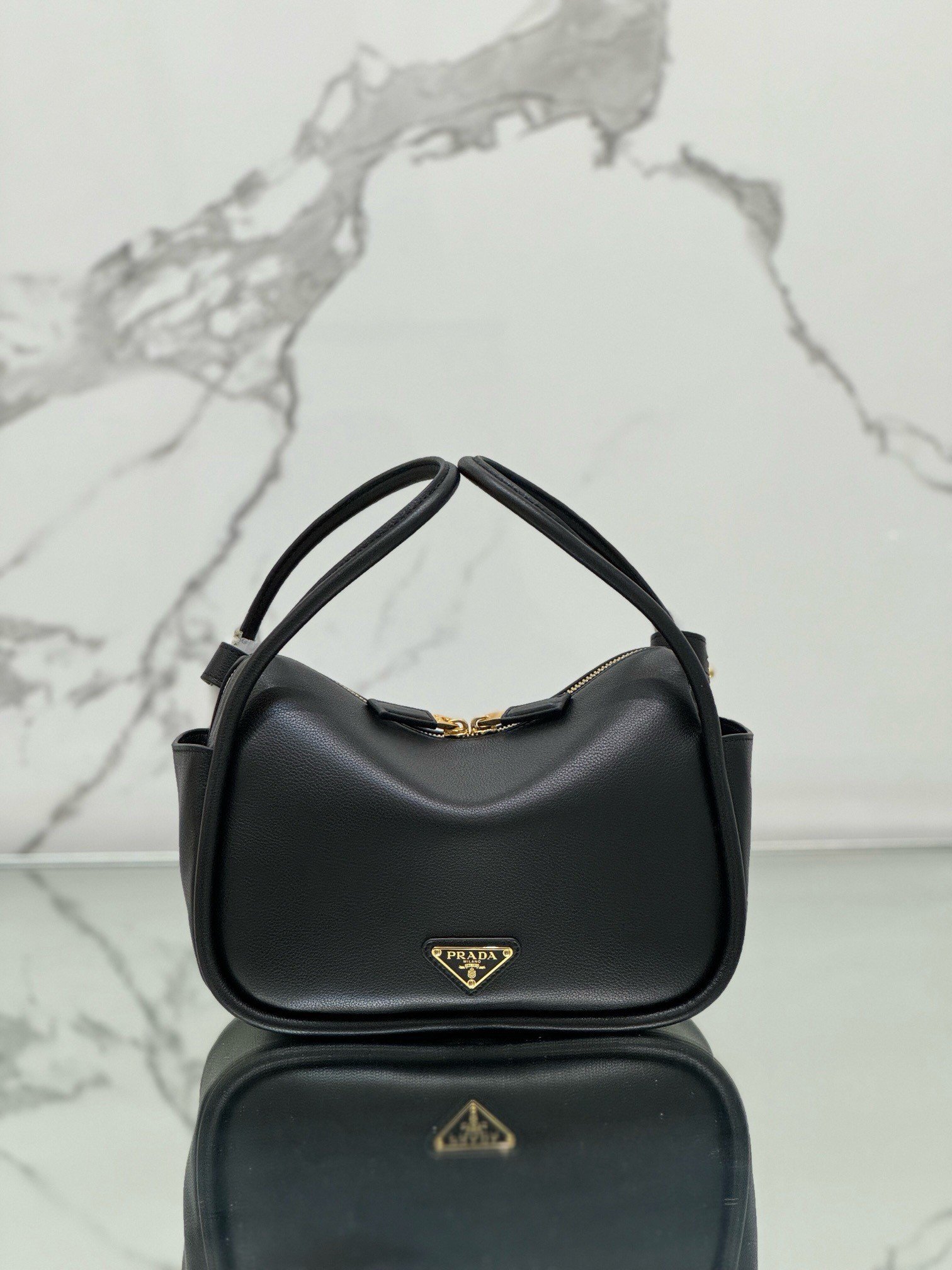 Prada Top Handle Bag in Black Grained Leather