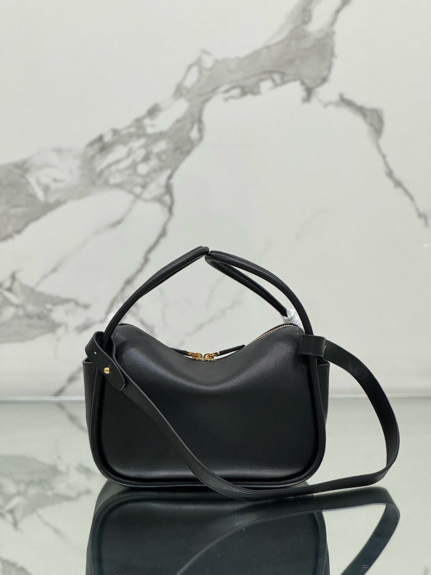 Prada Top Handle Bag in Black Grained Leather