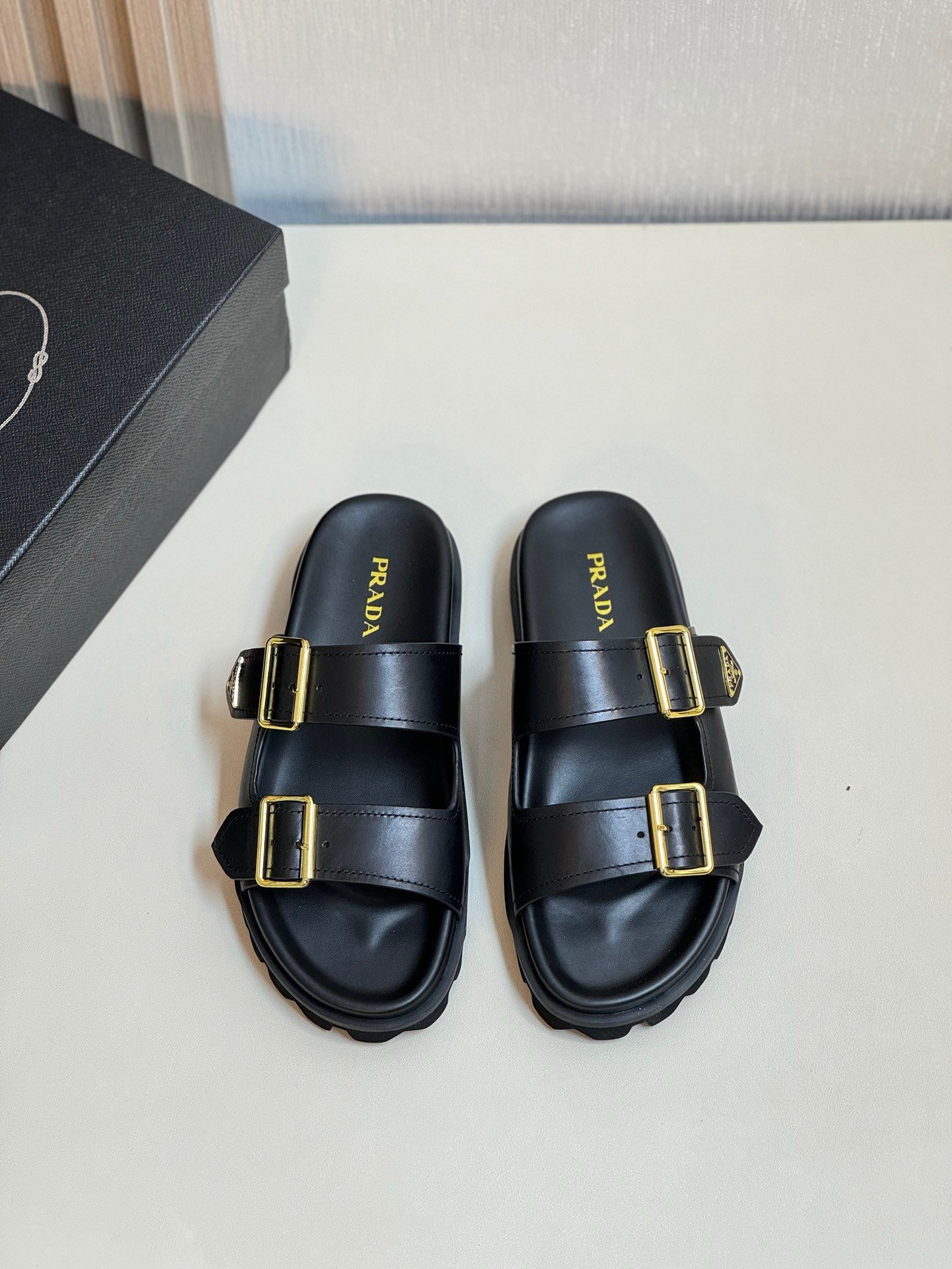 Prada Women's Strap Slides Sandals in Black Leather