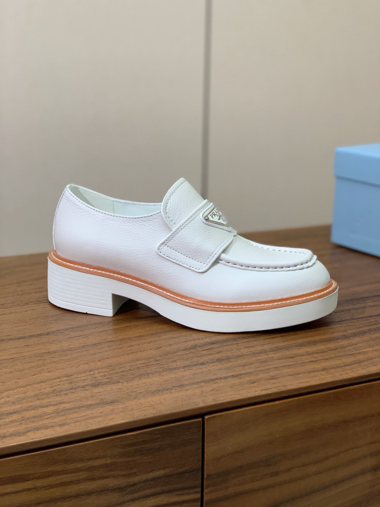 Prada Women's Loafers in White Grained Leather