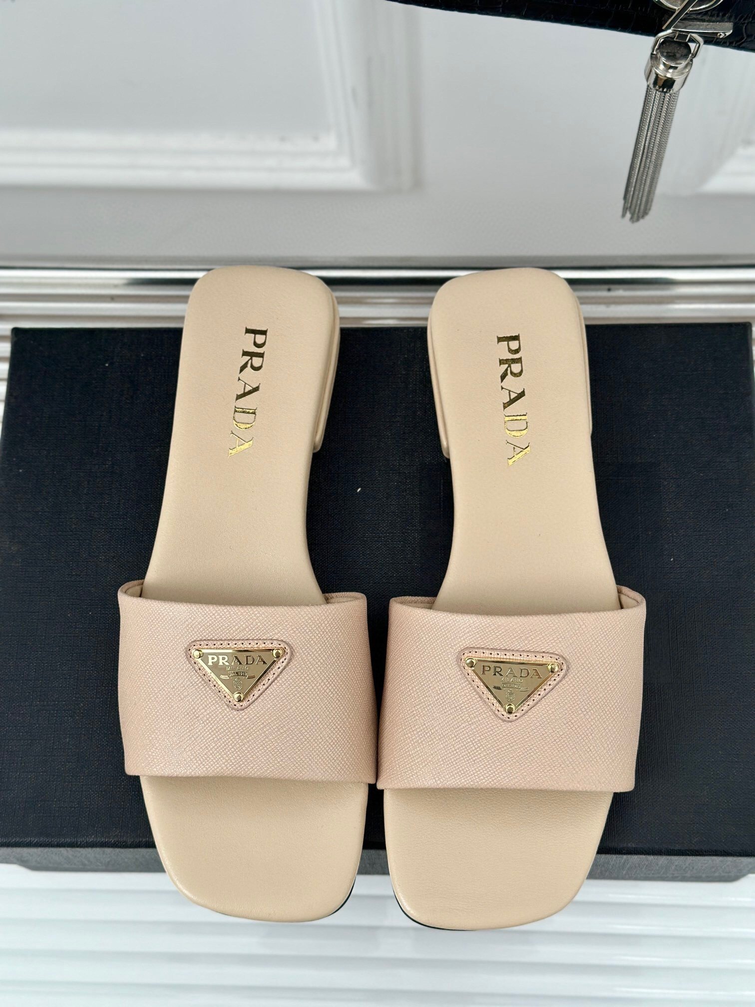 Prada Women's Slides in Beige Saffiano Leather