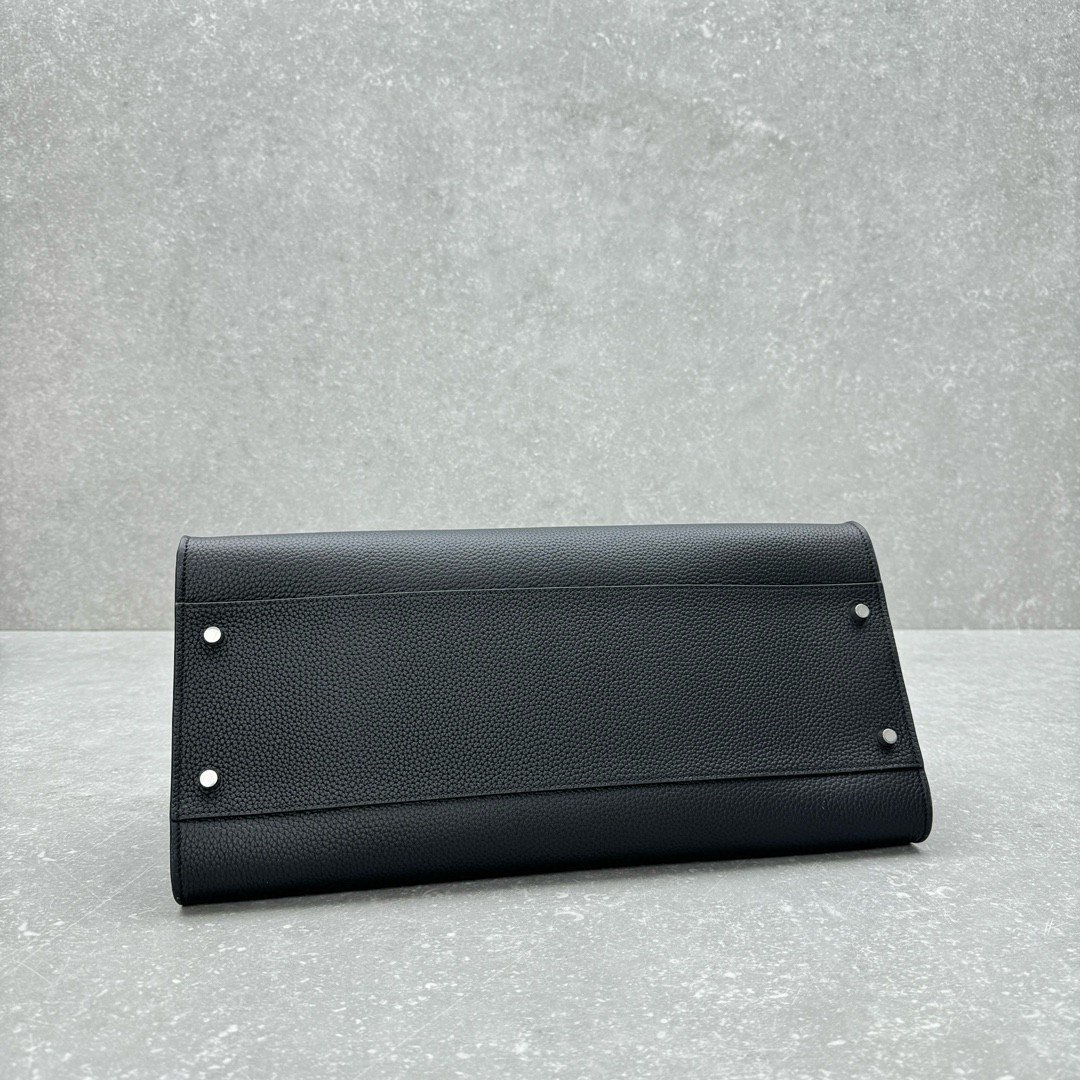 The Row Margaux EW Top Handle Bag in Black Grained Leather