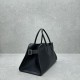 The Row Margaux EW Top Handle Bag in Black Grained Leather