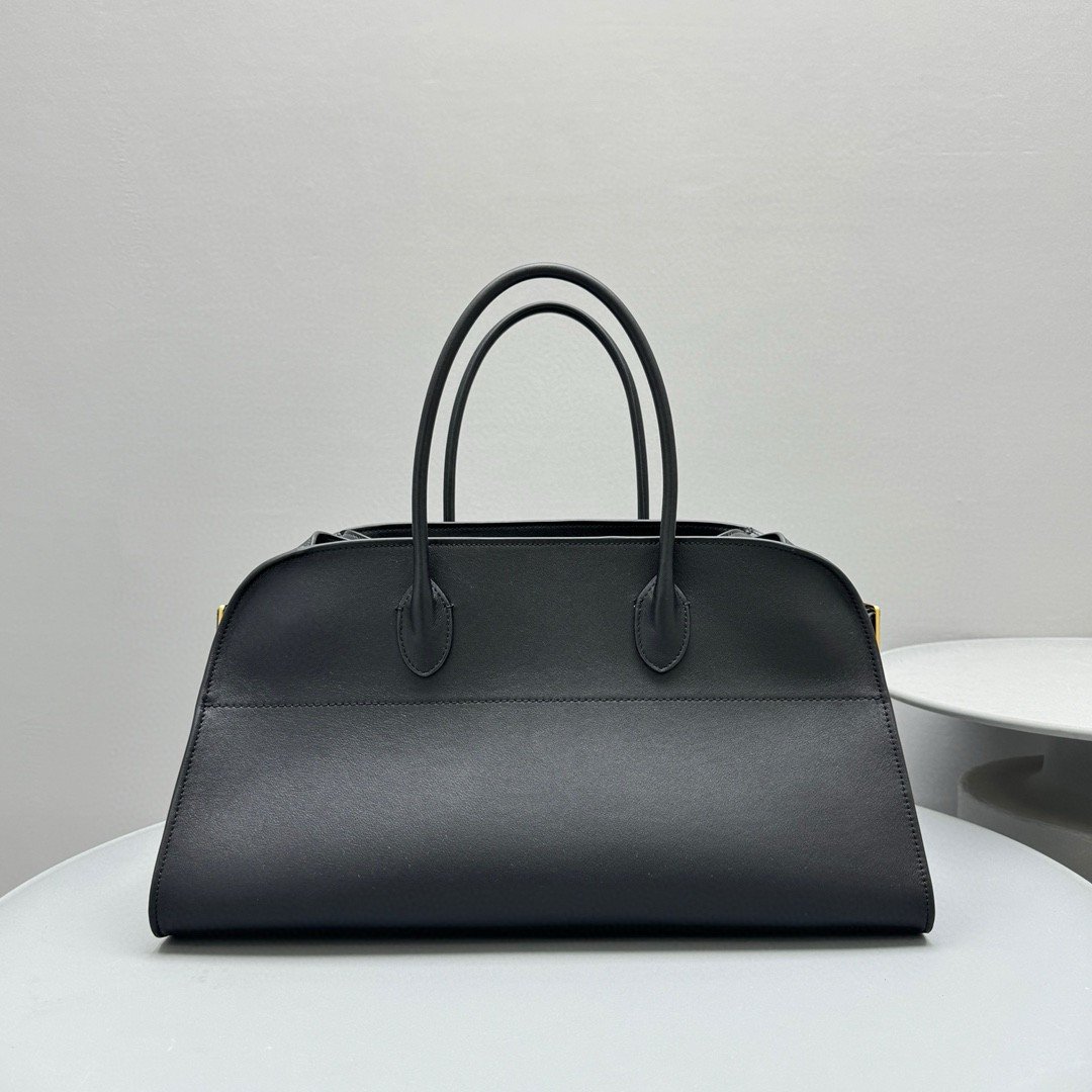 The Row Margaux EW Top Handle Bag in Black Smooth Calfskin