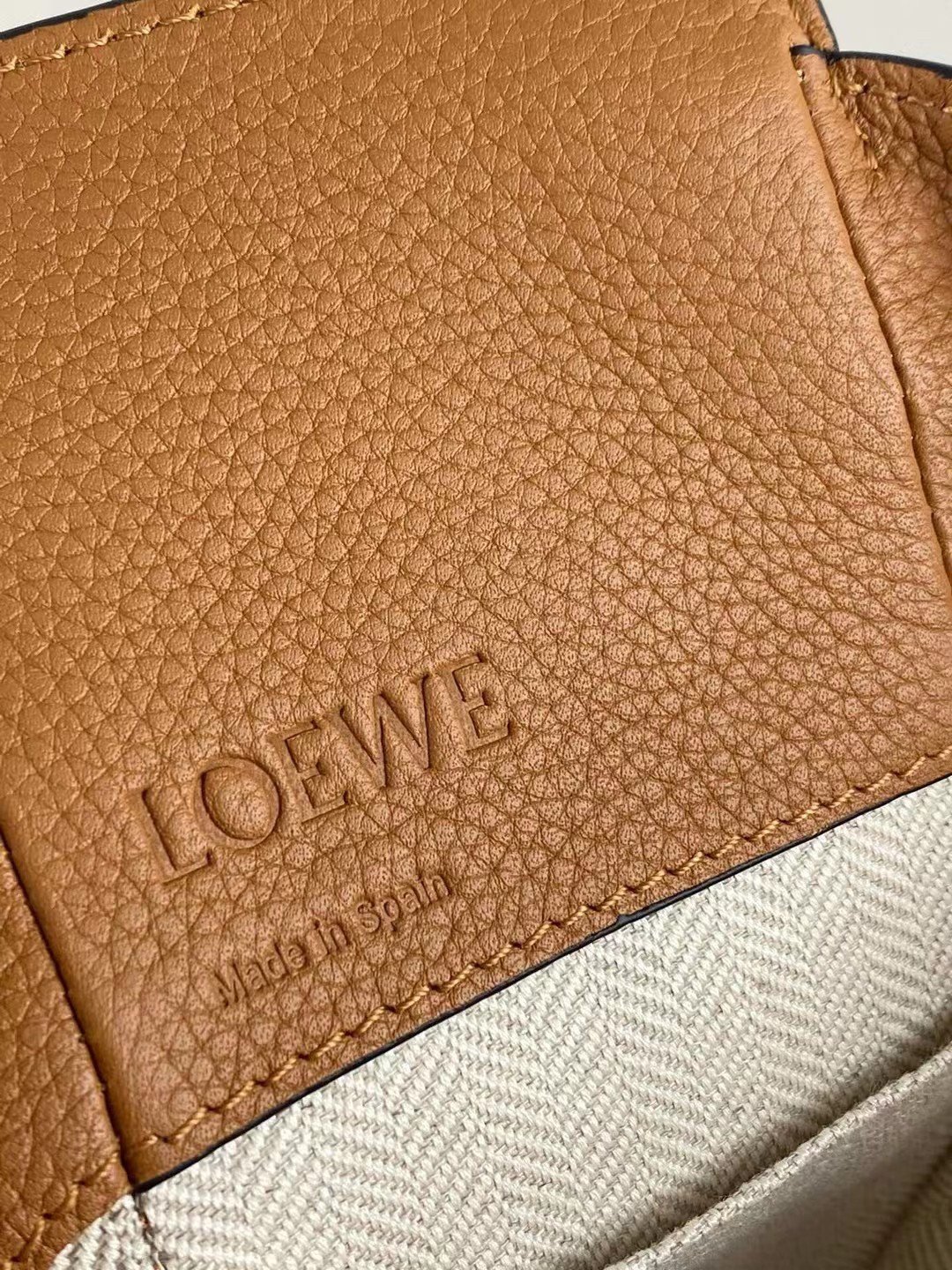 Loewe Mini Hammock Drawstring Bag In Brown Grained Leather